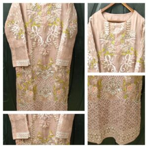 stunning pink shirt with yellow embroidery